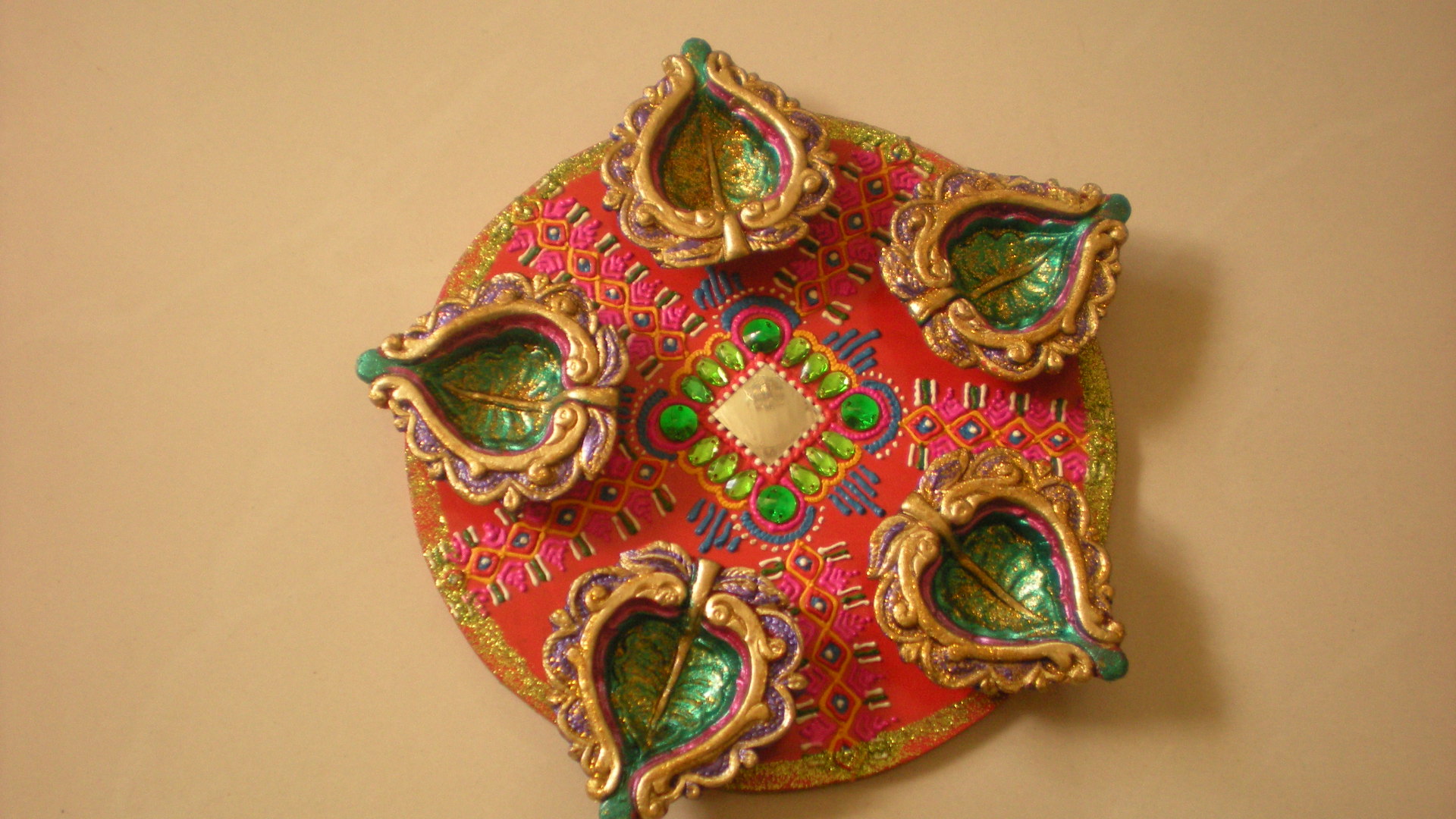 Manufacturers Exporters and Wholesale Suppliers of Rangoli diya plates 01 Nagpur Maharashtra